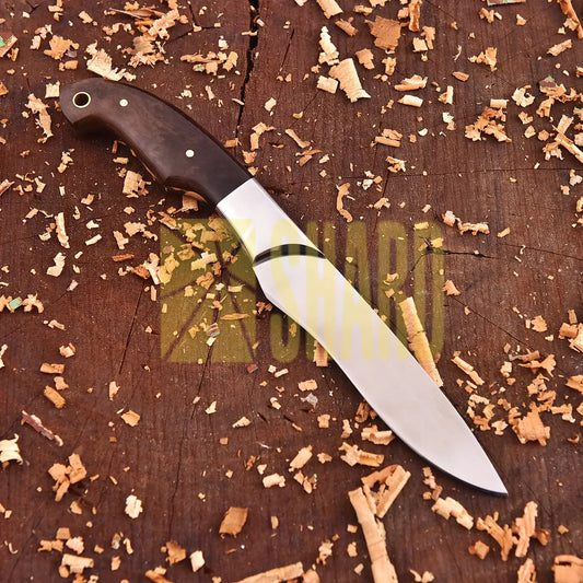 Clear steel kitchen tool with polished blade and rosewood handle – The Hearthwood Companion