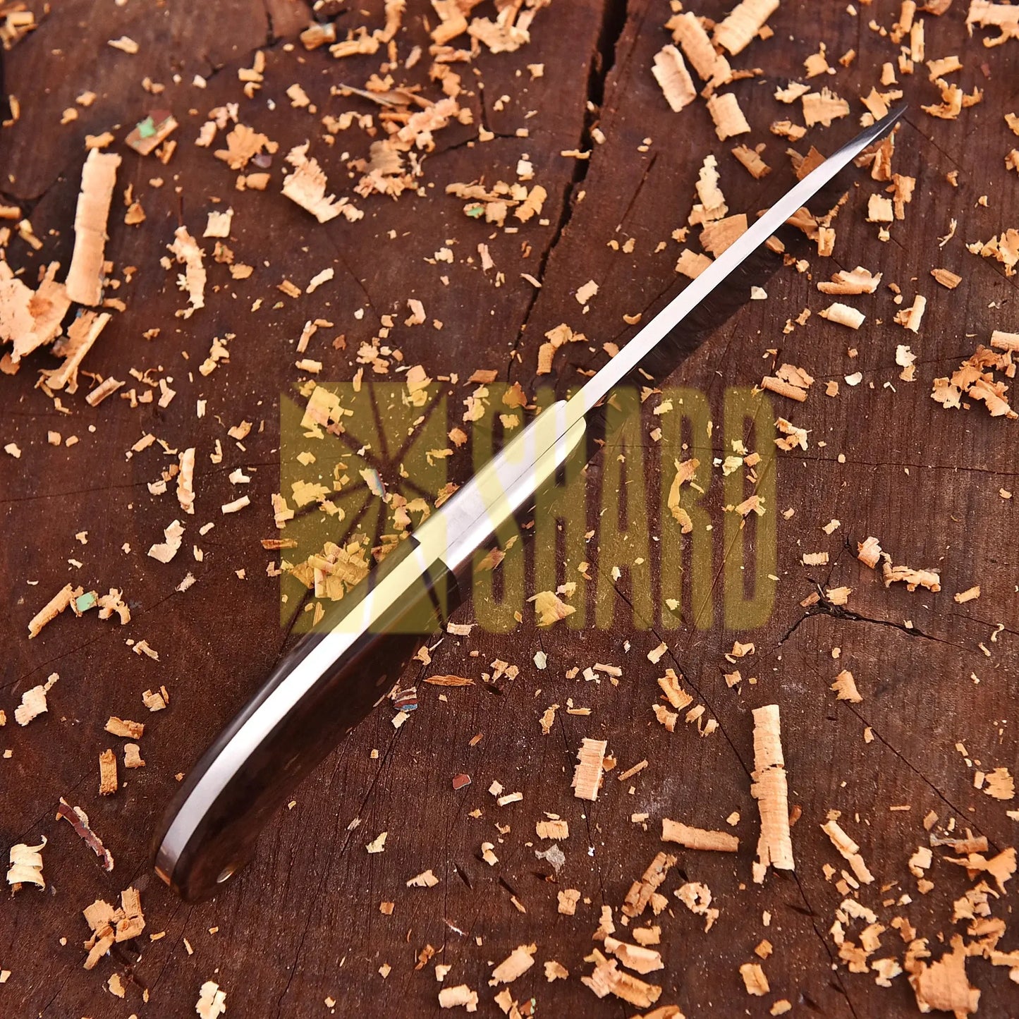 Clear steel kitchen tool with polished blade and rosewood handle – The Hearthwood Companion