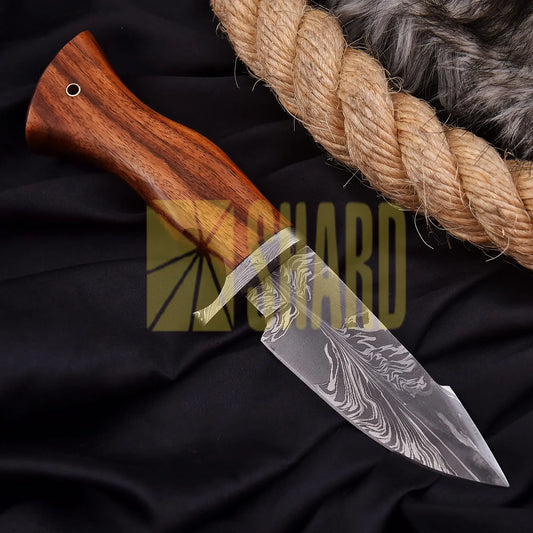 Heritage Damascus collectible with feather pattern Damascus steel and natural wood handle