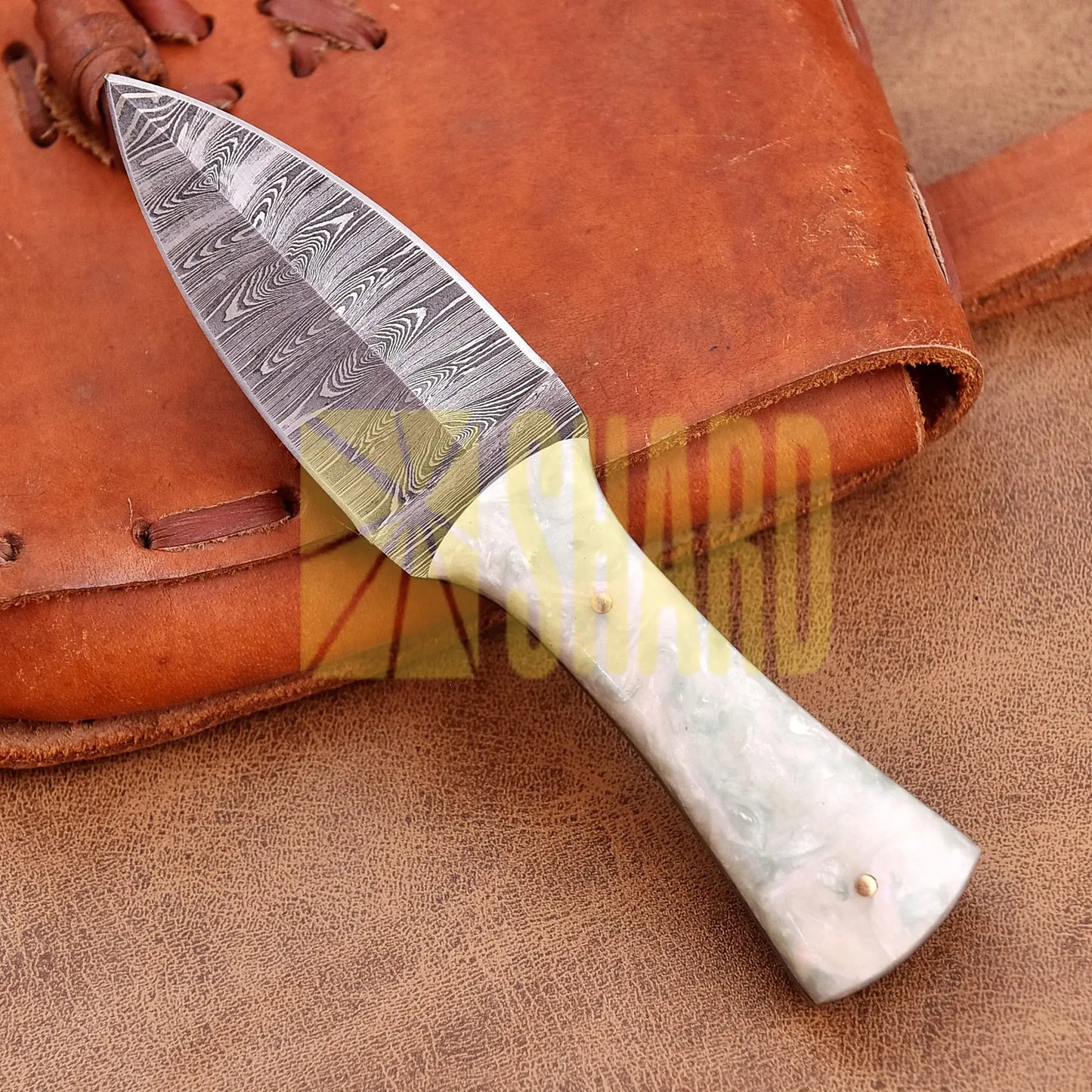 Hand-forged Damascus steel collectible with raindrop pattern and mother of pearl resin handle – Eternal Raindrop gift piece