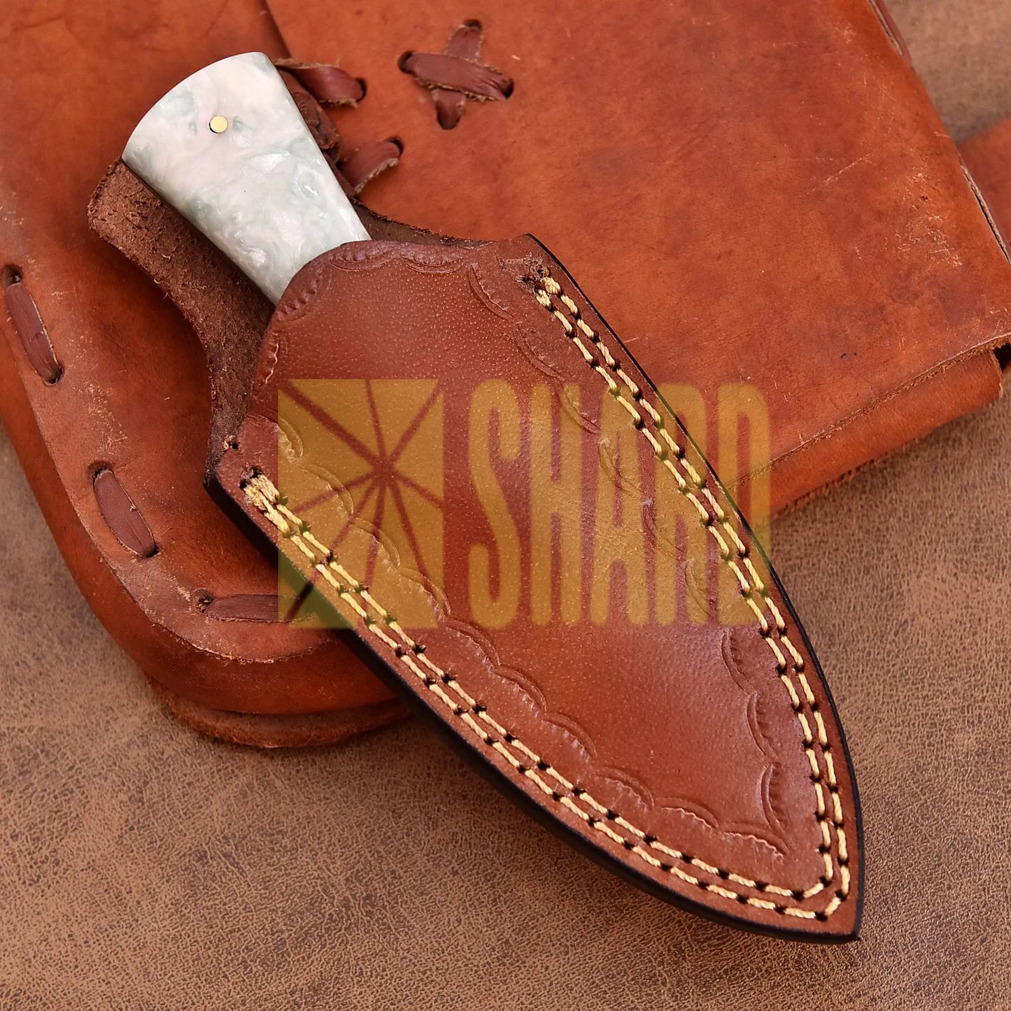 Hand-forged Damascus steel collectible with raindrop pattern and mother of pearl resin handle – Eternal Raindrop gift piece