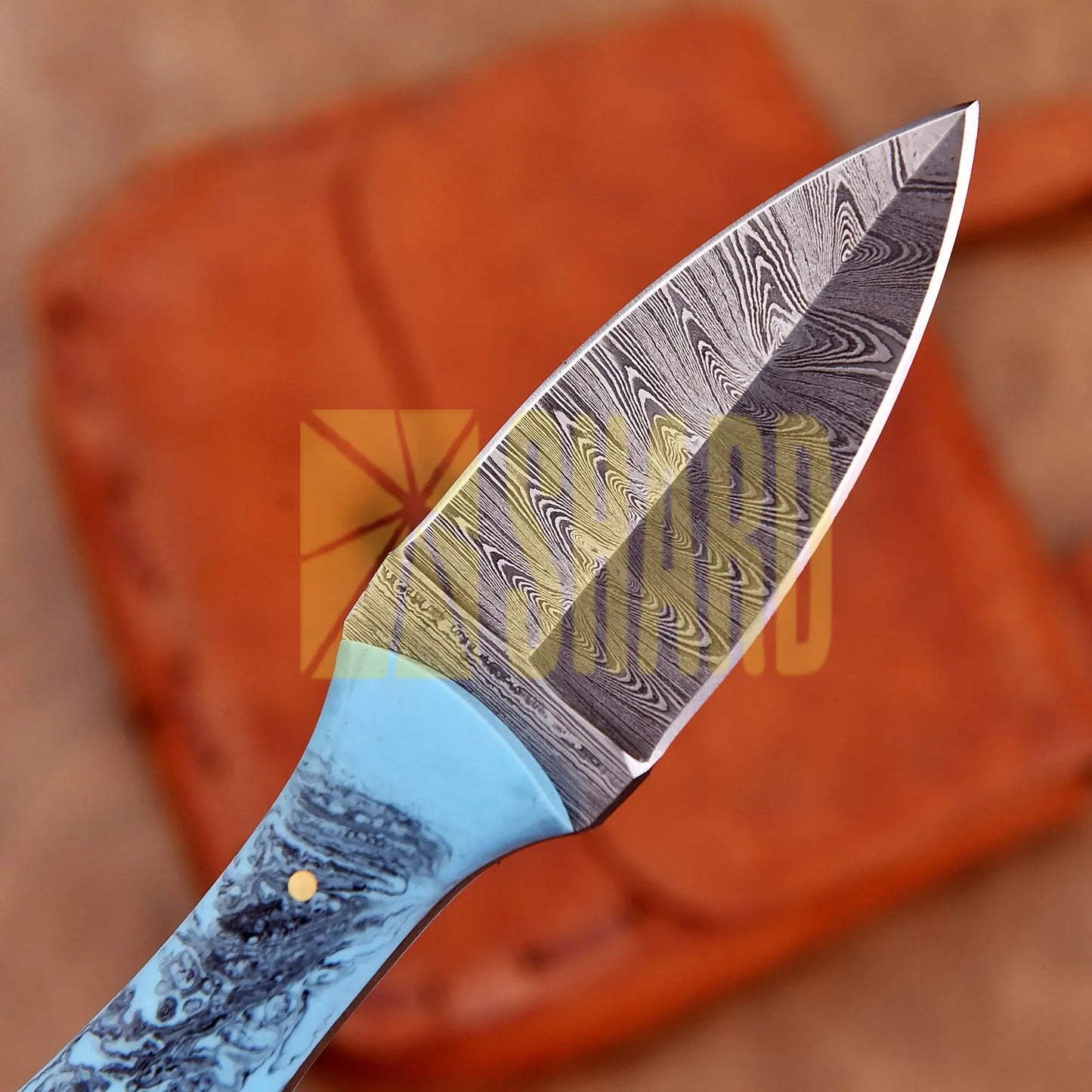 Hand-forged Damascus steel collectible with raindrop pattern and light blue resin handle – Eternal Raindrop gift piece