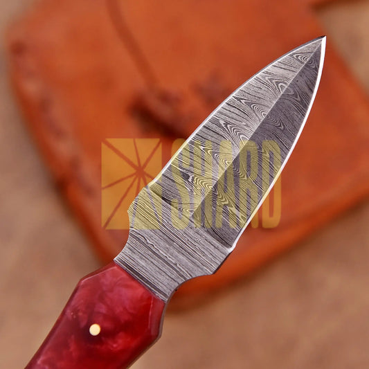 Hand-forged Damascus steel collectible with raindrop pattern and red ruby resin handle – Raindrop Trail gift piece