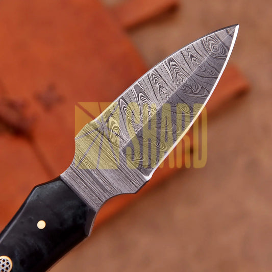 Hand-forged Damascus steel collectible with raindrop pattern and black resin handle – Raindrop Trail gift piece