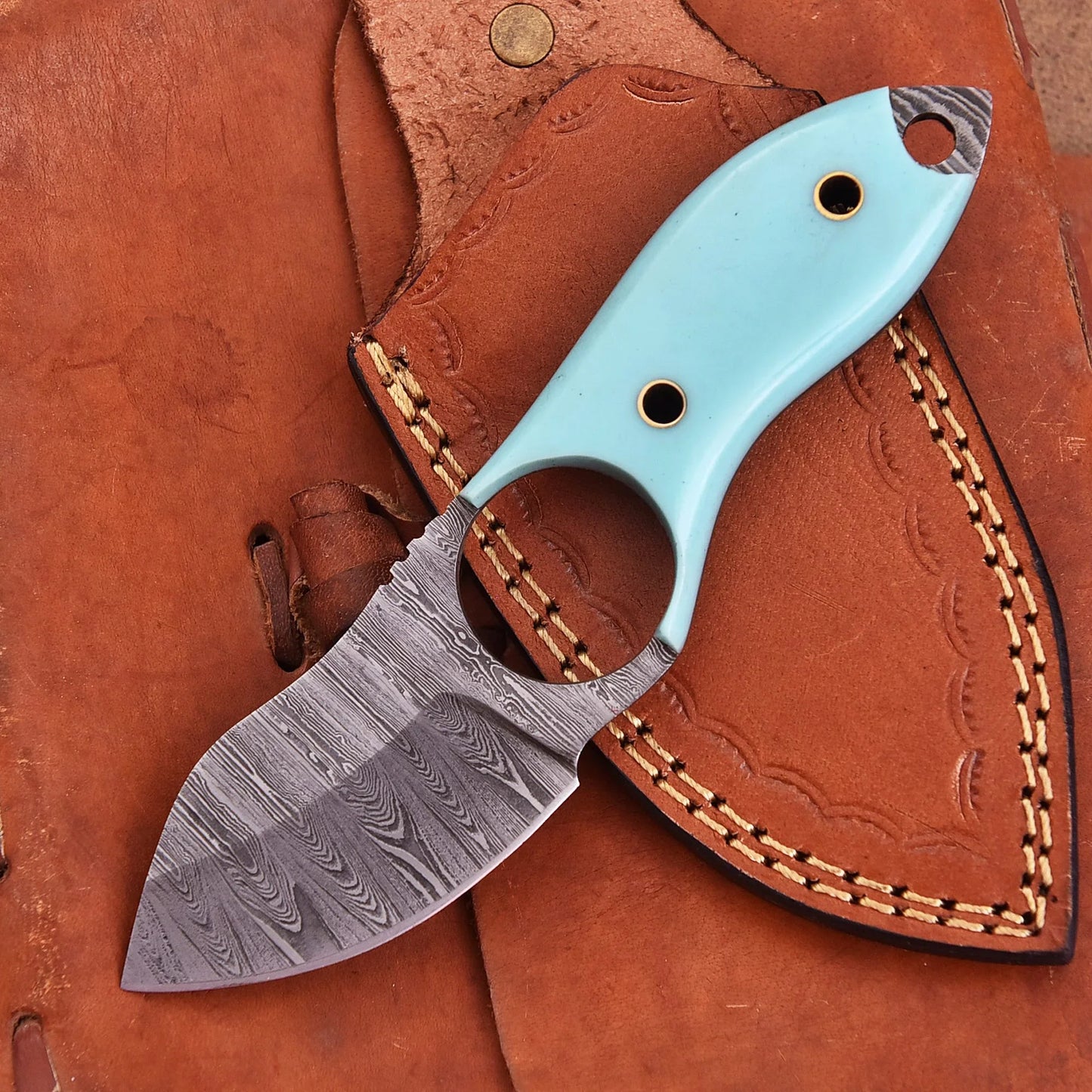 Hand-forged Damascus steel collectible with raindrop pattern and light blue resin handle – Raindrop Mini gift piece