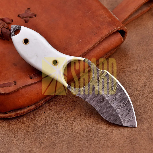 Hand-forged Damascus steel collectible with raindrop pattern and white resin handle – Raindrop Mini gift piece