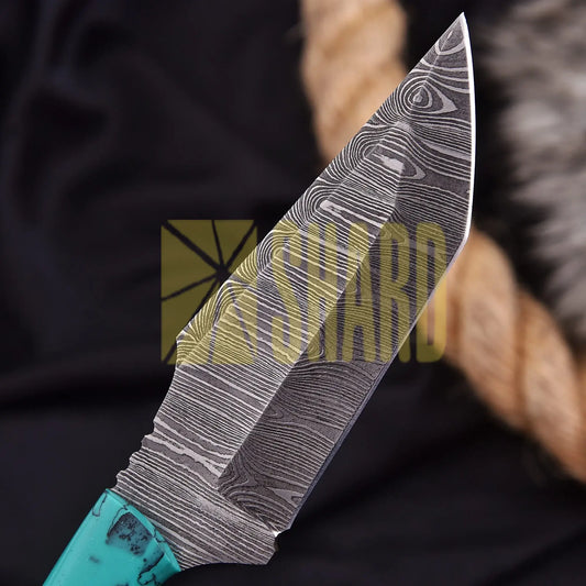 Hand-forged Damascus steel collectible with raindrop pattern and sky blue Micarta handle – Raindrop Mini gift piece