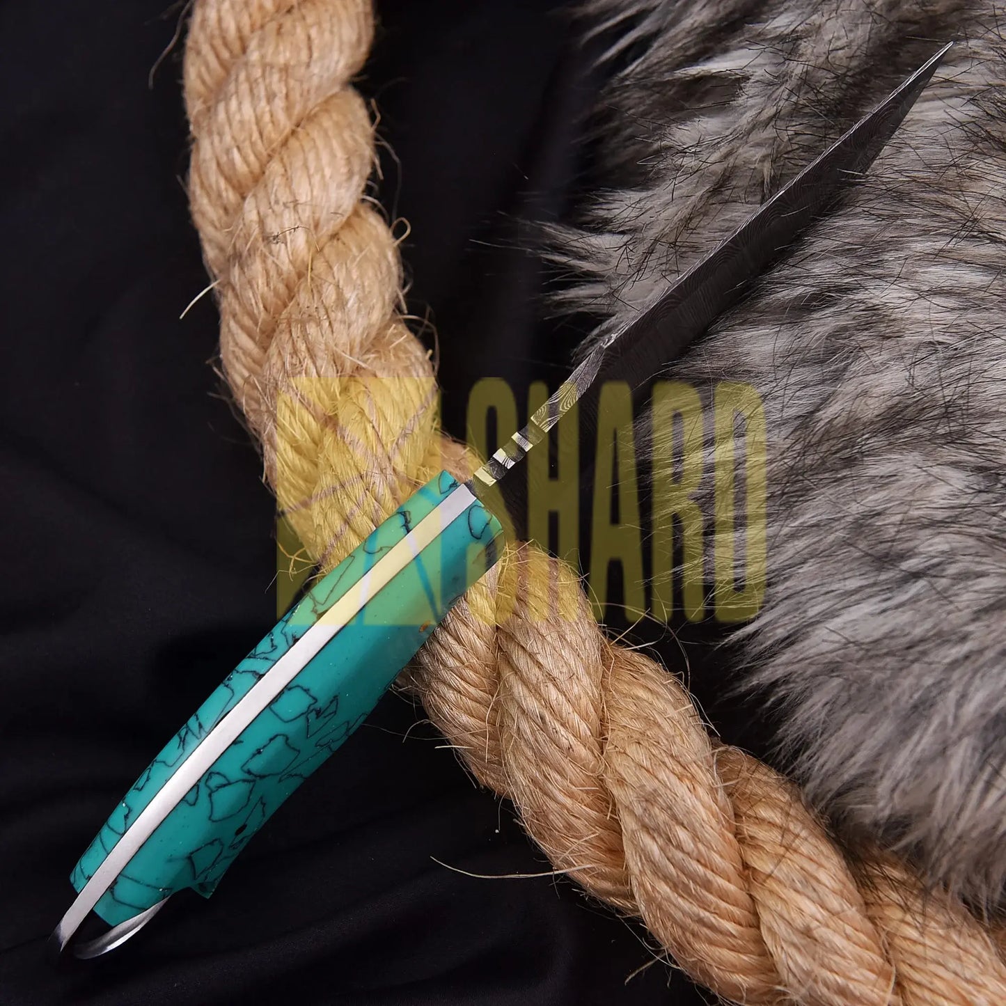 Hand-forged Damascus steel collectible with raindrop pattern and sky blue Micarta handle – Raindrop Mini gift piece
