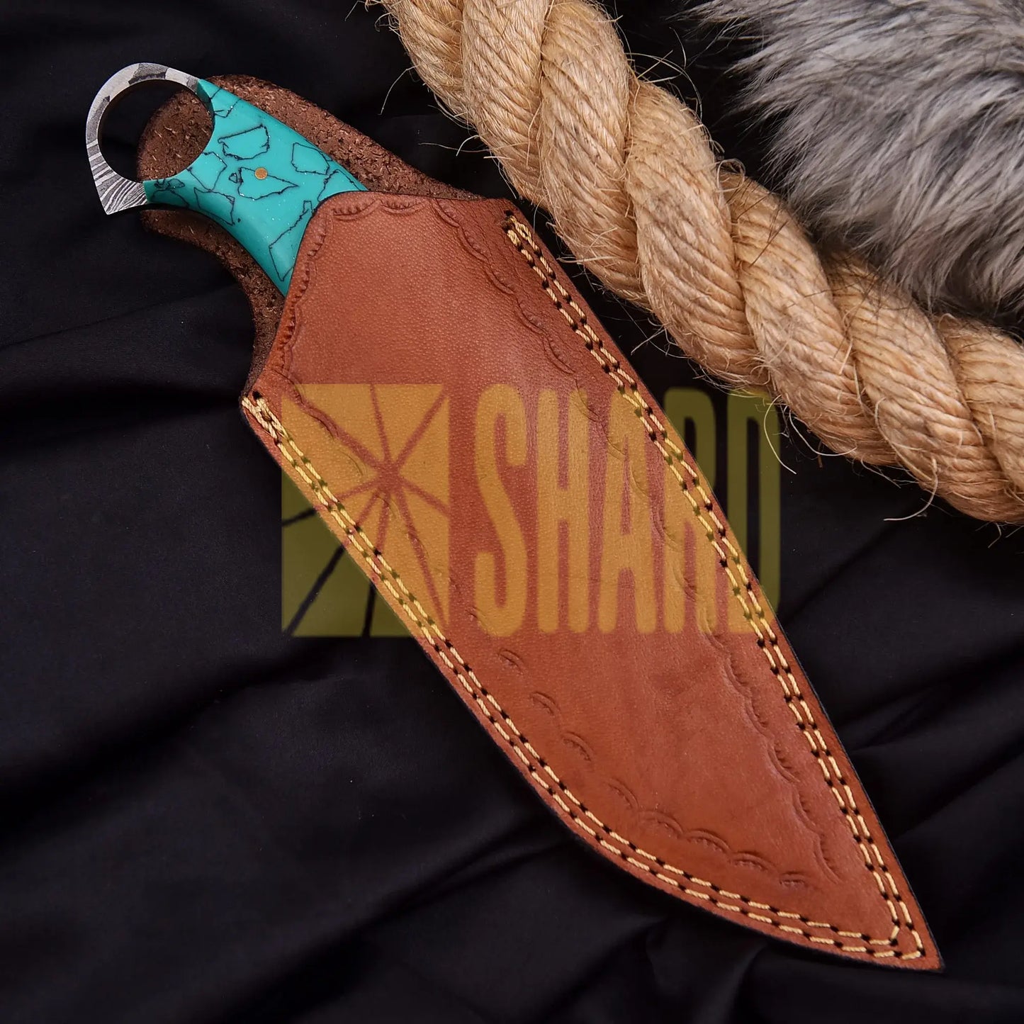 Hand-forged Damascus steel collectible with raindrop pattern and sky blue Micarta handle – Raindrop Mini gift piece