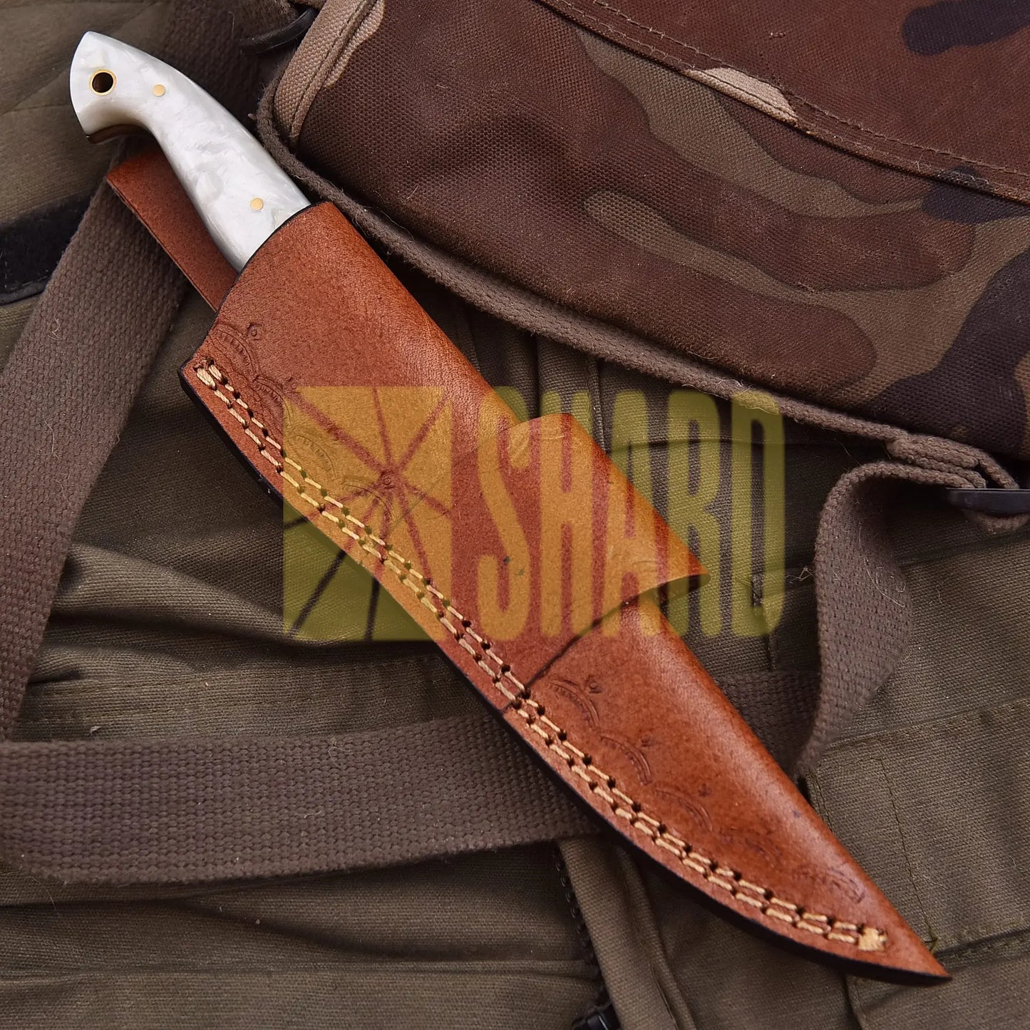 Hand-forged Damascus steel collectible with raindrop pattern and mother-of-pearl resin handle – Raindrop Pearl gift piece