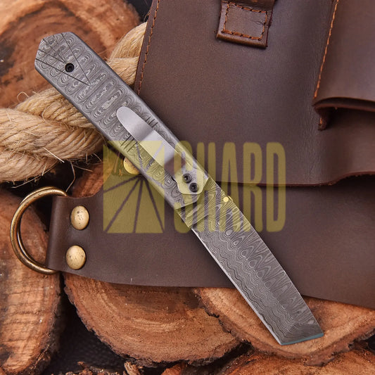 Crimson Crest Damascus Steel Folding Utility Craft with raindrop and wave pattern, featuring folding design and belt buckle clip.