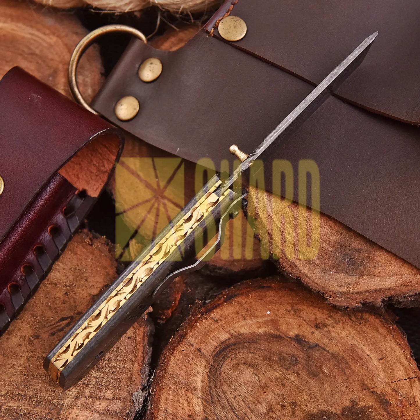 Crimson Crest Damascus Steel Folding Utility Craft with raindrop and wave pattern, featuring folding design and belt buckle clip.