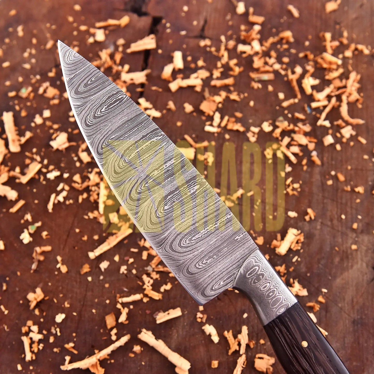 Hand-forged Damascus raindrop steel chef’s tool with rosewood handle – Emberleaf by Shard Blade