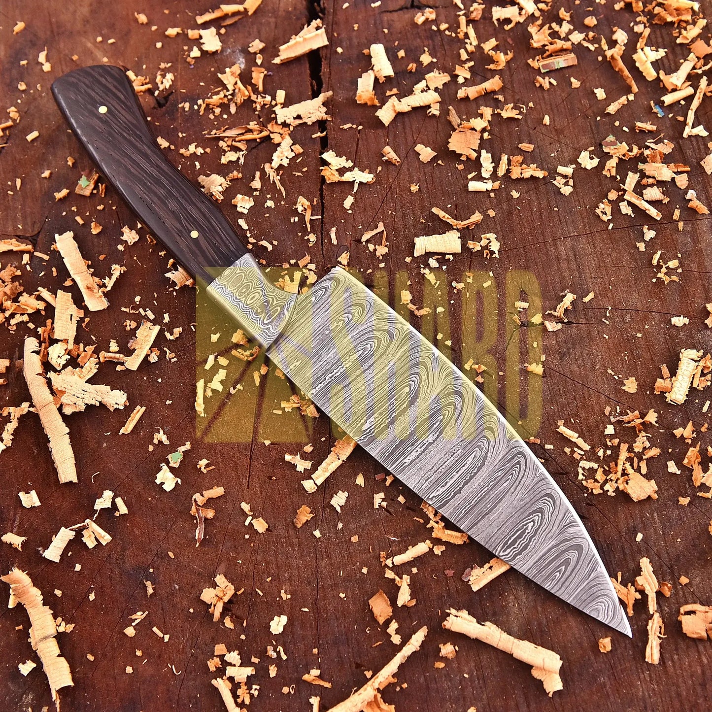 Hand-forged Damascus raindrop steel chef’s tool with rosewood handle – Emberleaf by Shard Blade