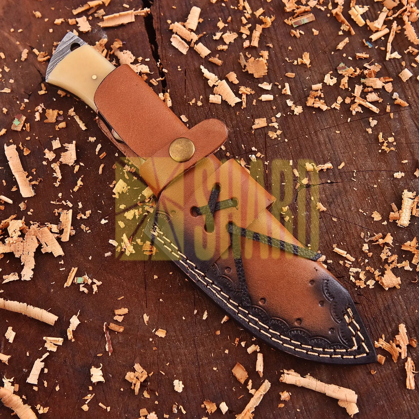 Lunar Howl Damascus collectible with wolf cut-out design and bone handle