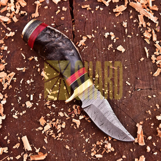 Stagcrest Damascus Mini Collectorโs Tool with raindrop Damascus steel and stag handle