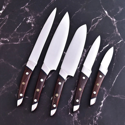 Handmade 5-piece chef set with clear steel finish, polished bolster, rosewood handles, and leather roll.