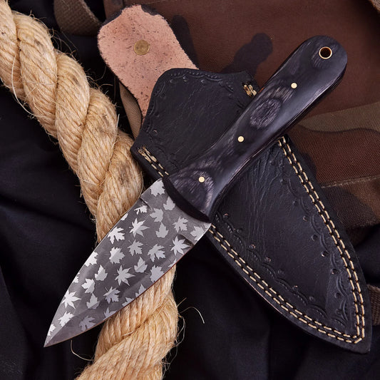 High-quality image of handmade custom carbon steel black wood maple pattern skinner with black dyed wood and leather carrying case