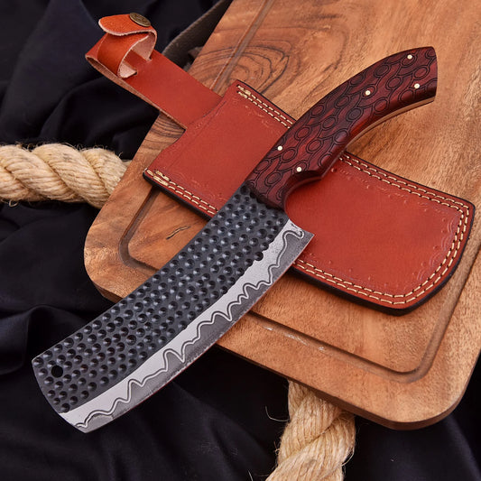 High-quality image of beautiful 1095 carbon steel hand forged clever chef kitchen knife with red wood handle and leather carrying case