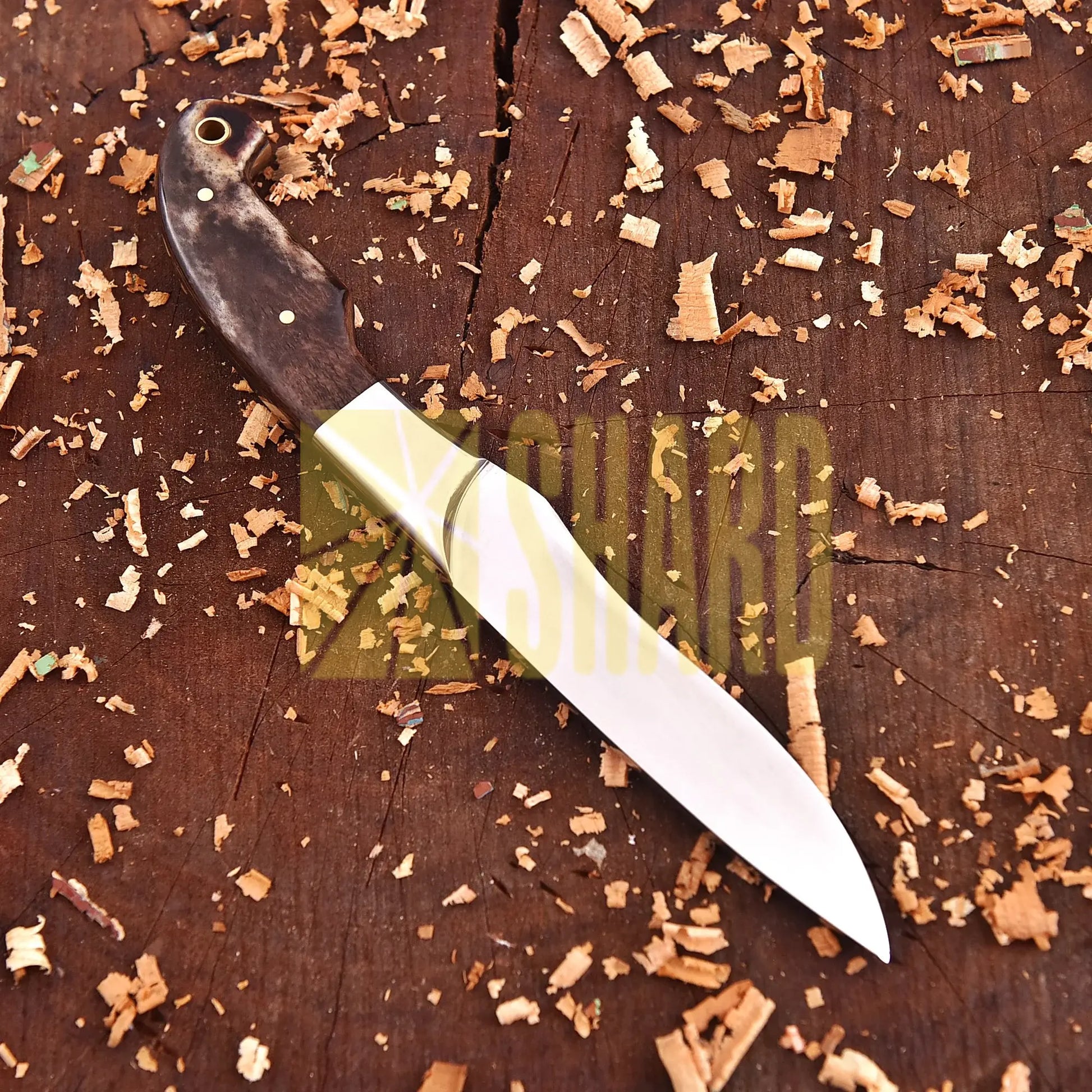 Clear steel kitchen tool with polished blade and rosewood handle – The Hearthwood Companion