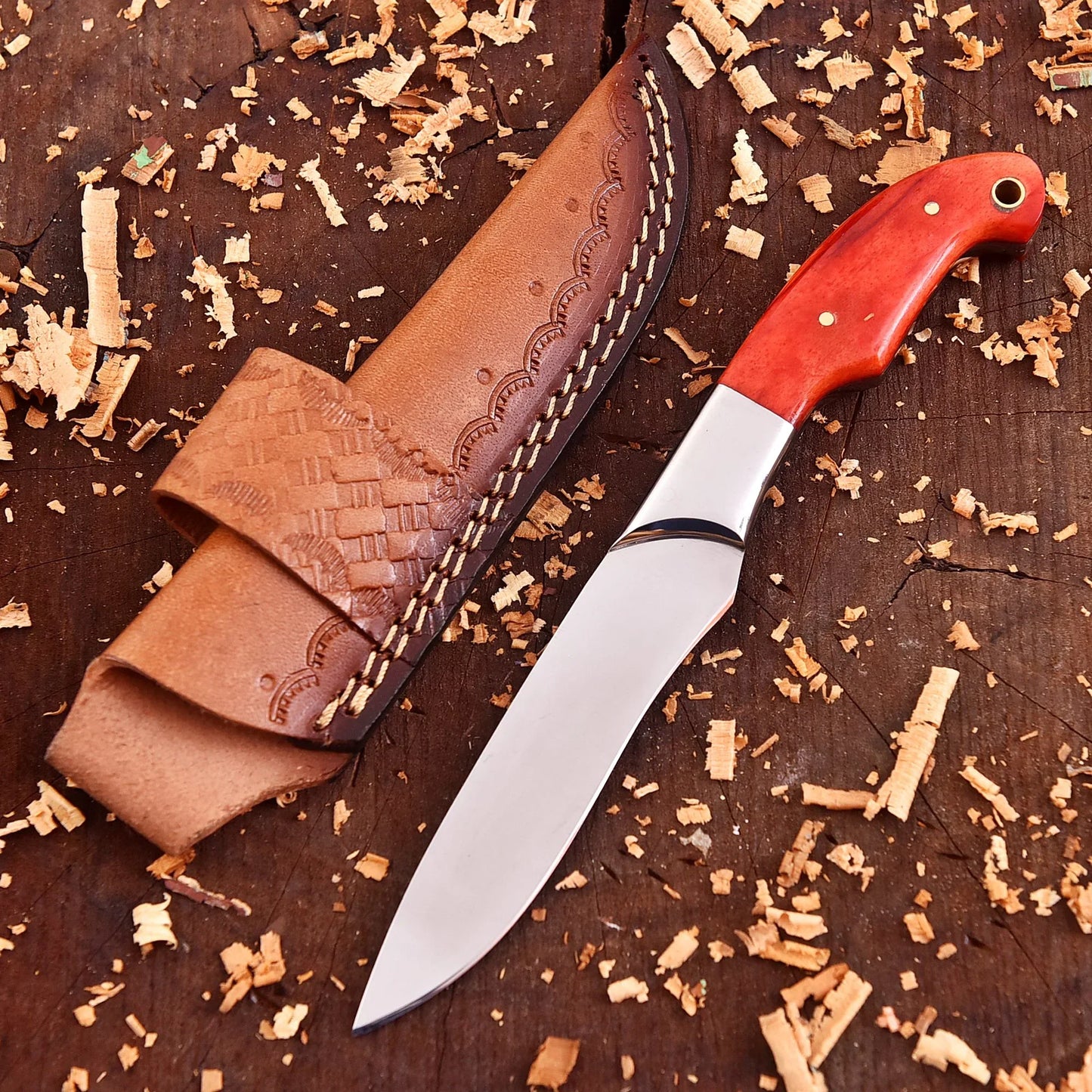 Clear steel kitchen tool with orange wood handle and bolster – The Embercrest Companion