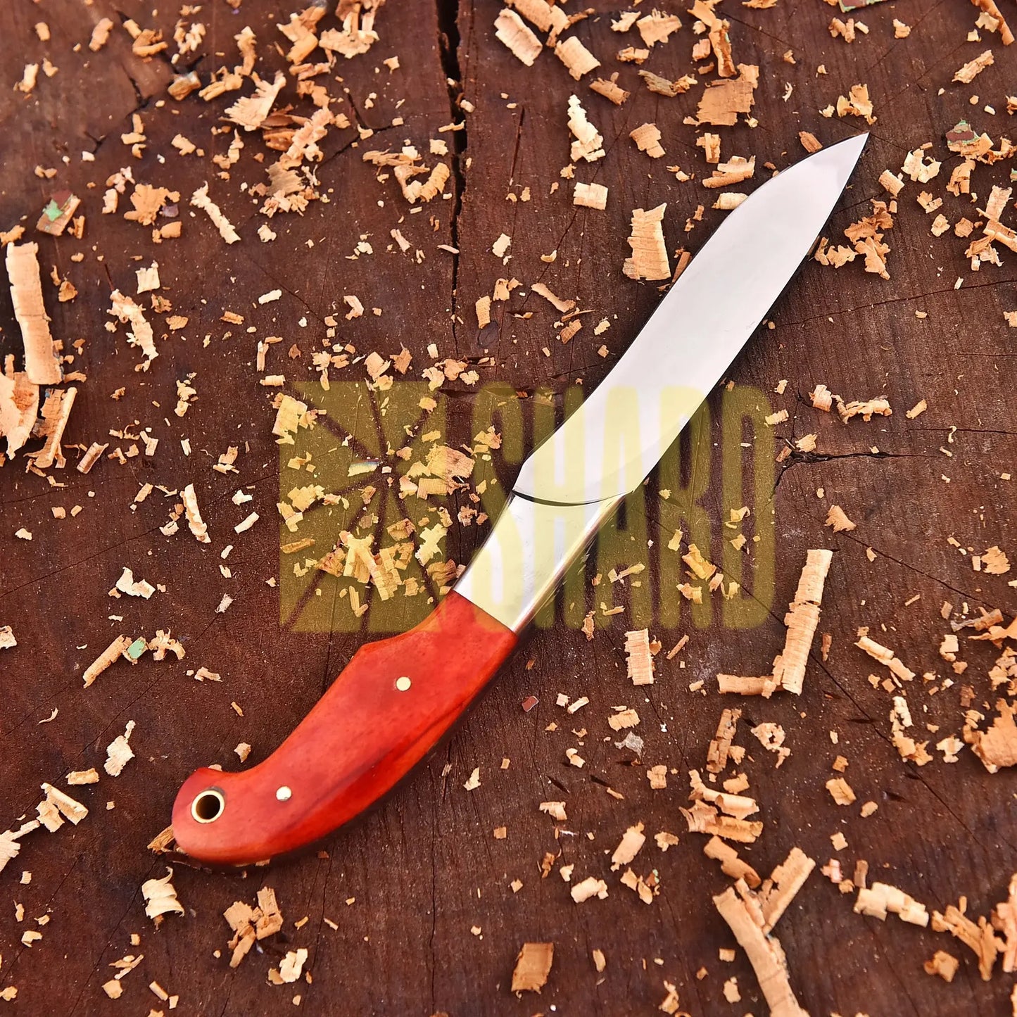 Clear steel kitchen tool with orange wood handle and bolster – The Embercrest Companion