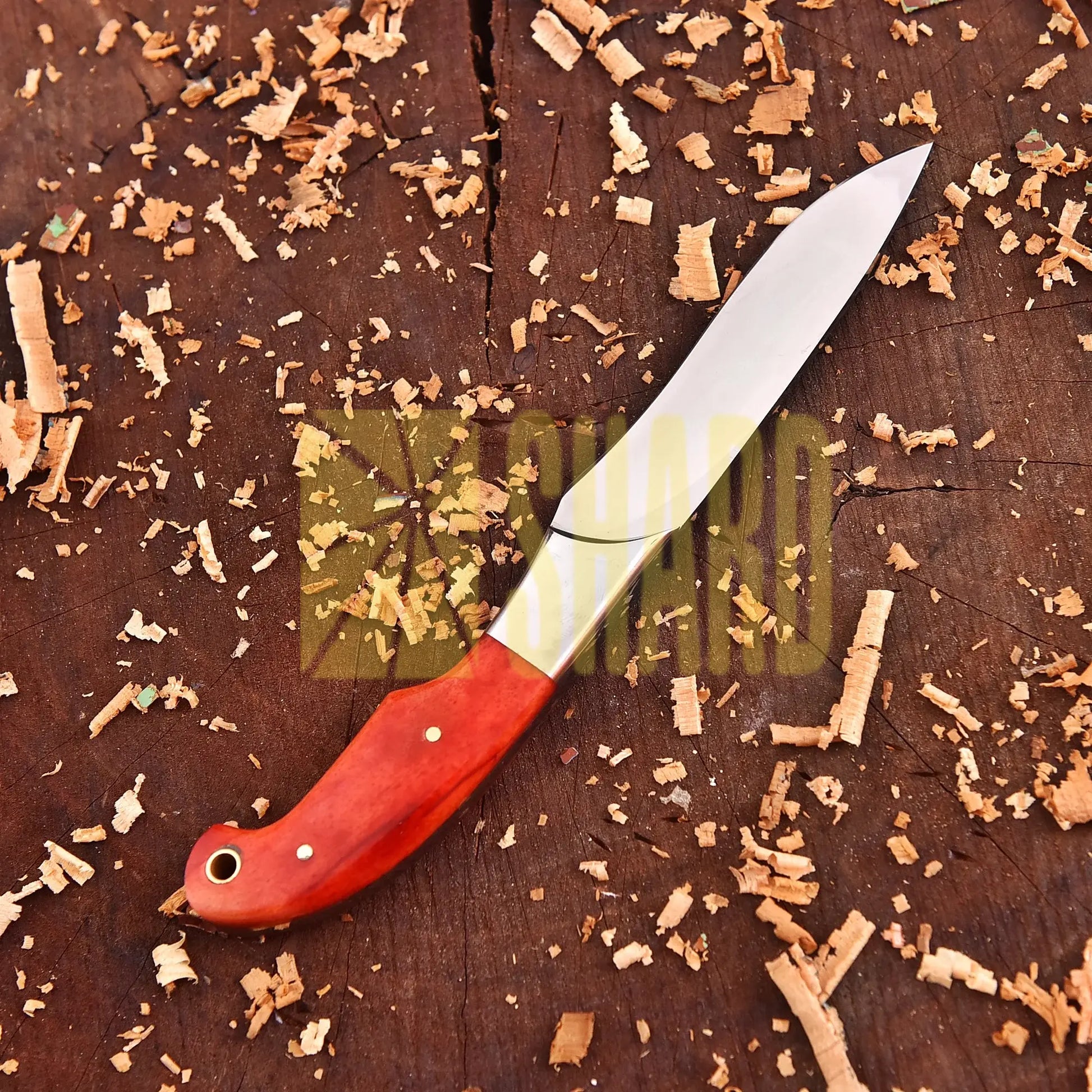Clear steel kitchen tool with orange wood handle and bolster – The Embercrest Companion