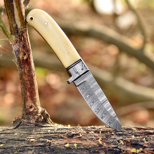 High-quality image of 8’’ handmade custom damascus steel skinner with guard and beautiful polished camel bone handle with leather carrying case