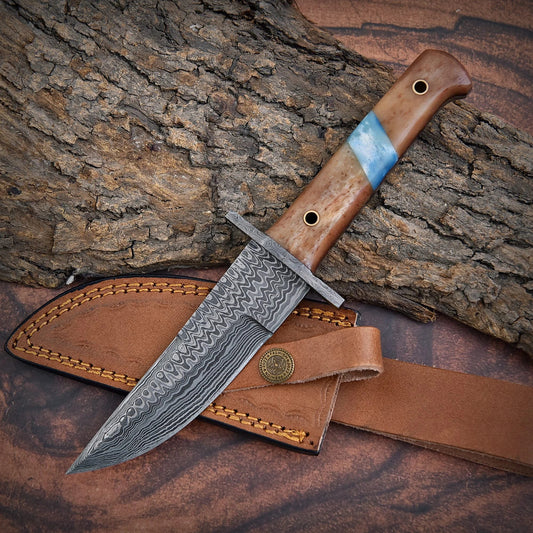 High-quality image of 9’’ handmade custom damascus steel skinner with guard and beautiful polished and tan & blue dyed bone handle with leather carrying case