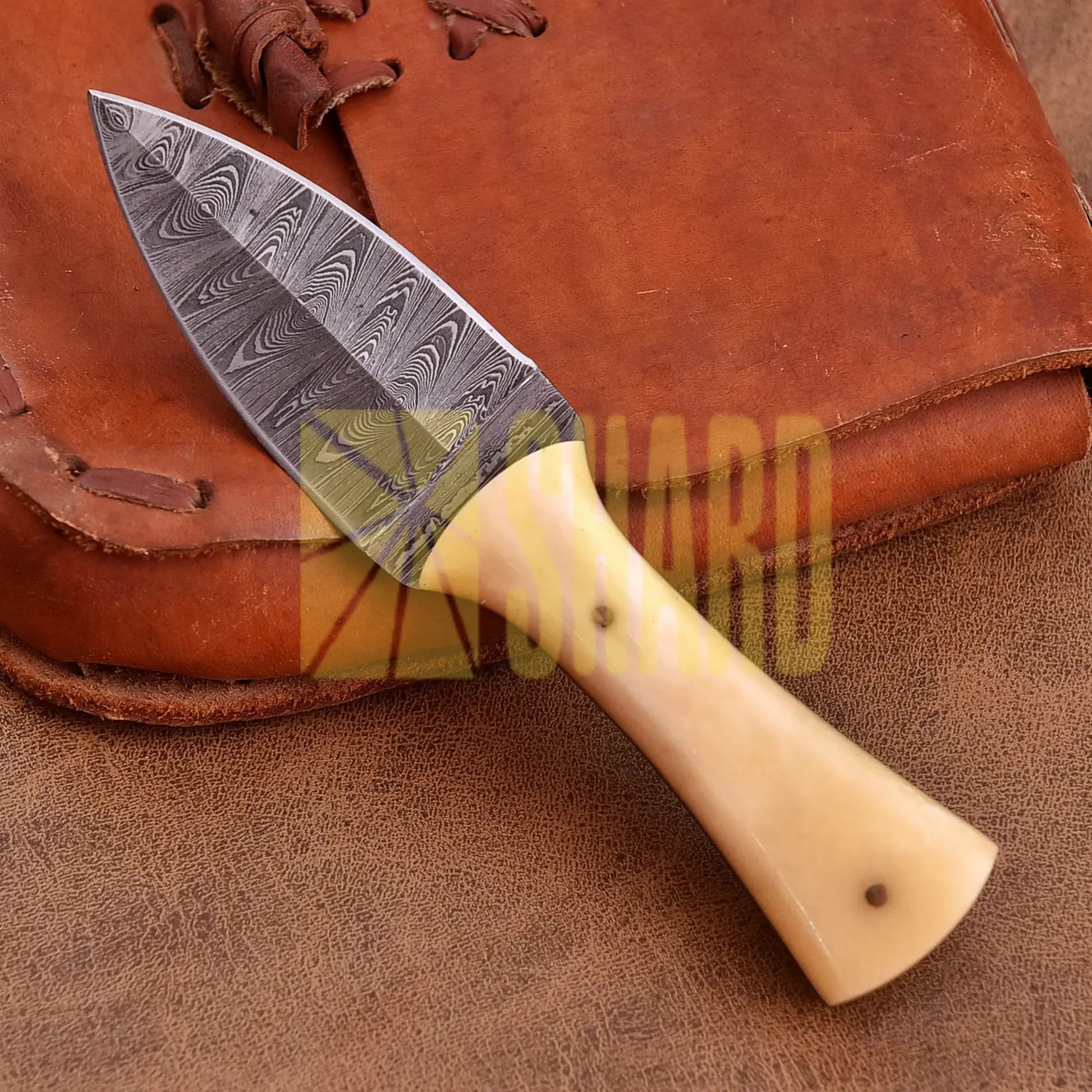 Hand-forged Damascus steel collectible with raindrop pattern and bone handle – Eternal Raindrop gift piece