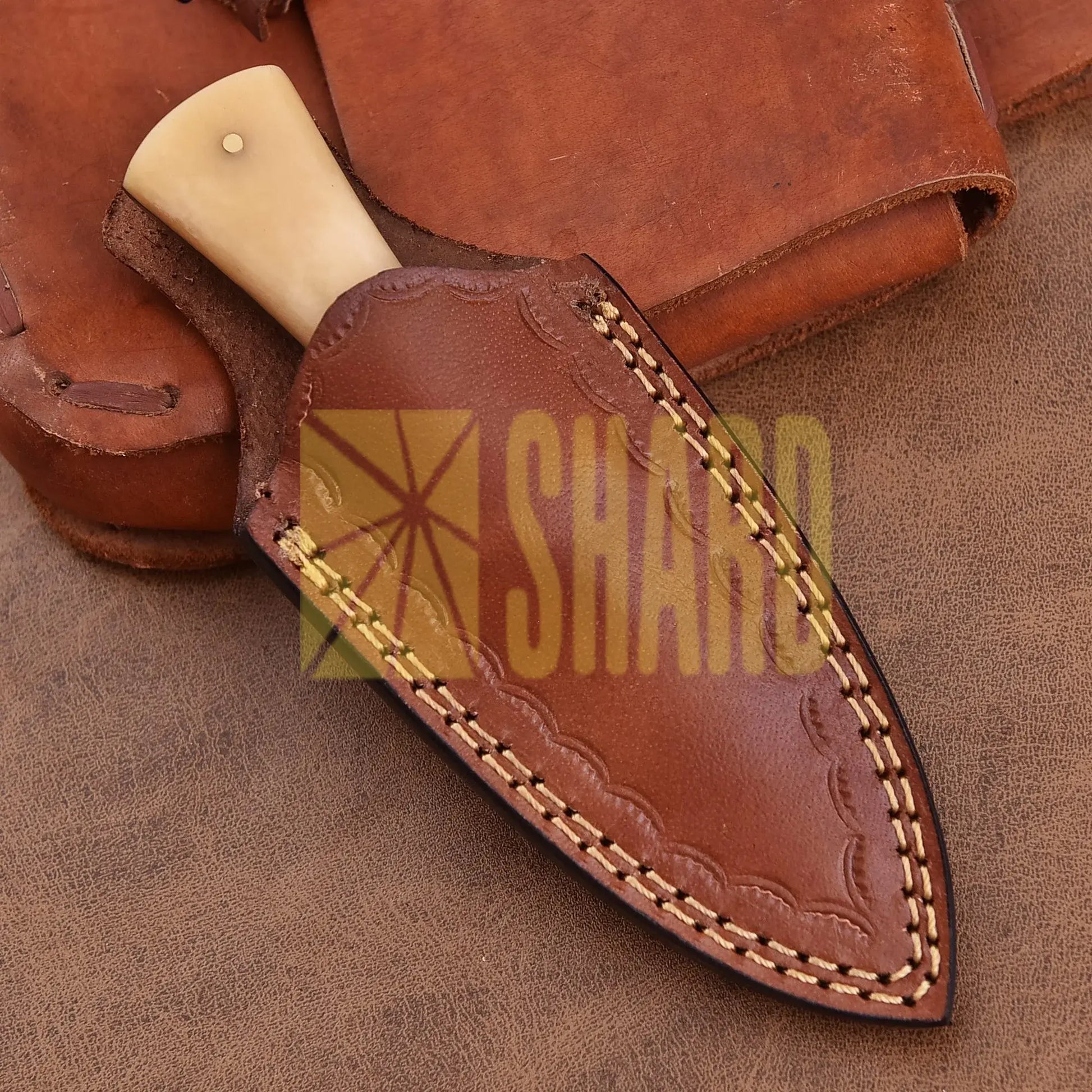 Hand-forged Damascus steel collectible with raindrop pattern and bone handle – Eternal Raindrop gift piece