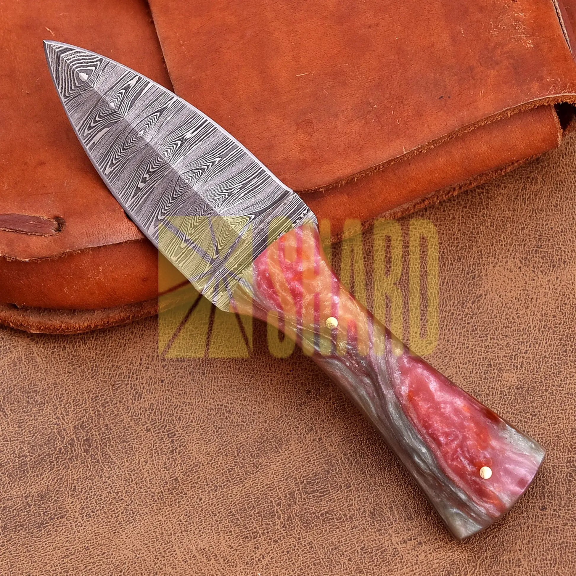 Hand-forged Damascus steel collectible with raindrop pattern and ruby red mixed resin handle – Eternal Raindrop gift piece