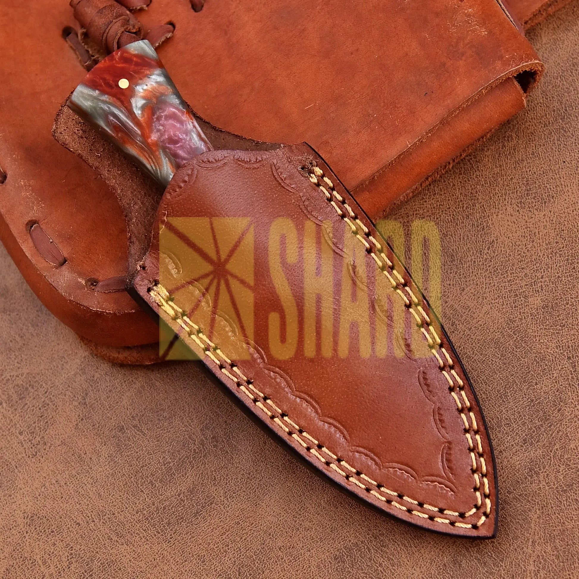 Hand-forged Damascus steel collectible with raindrop pattern and ruby red mixed resin handle – Eternal Raindrop gift piece