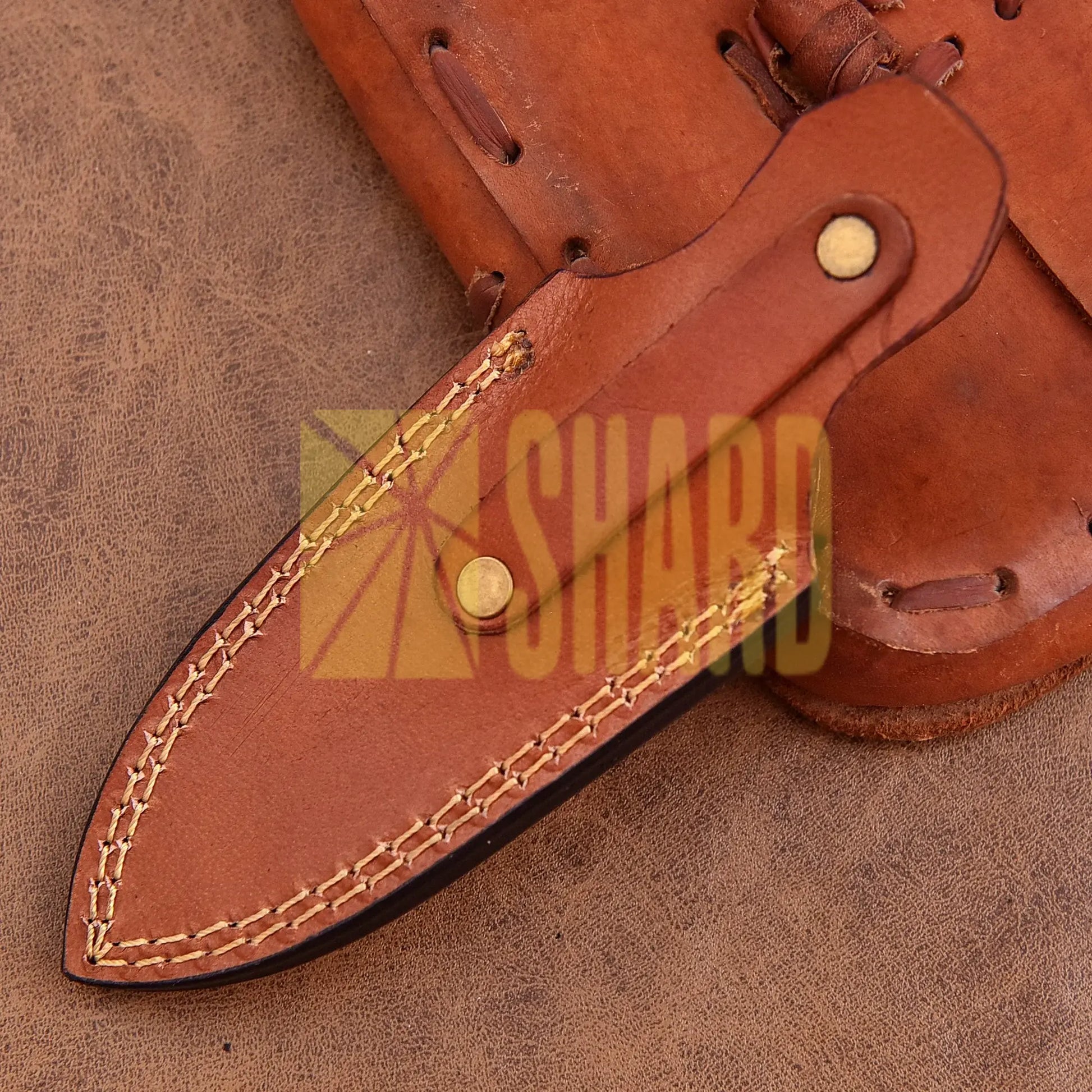Hand-forged Damascus steel collectible with raindrop pattern and honey-colored resin handle – Raindrop Trail gift piece