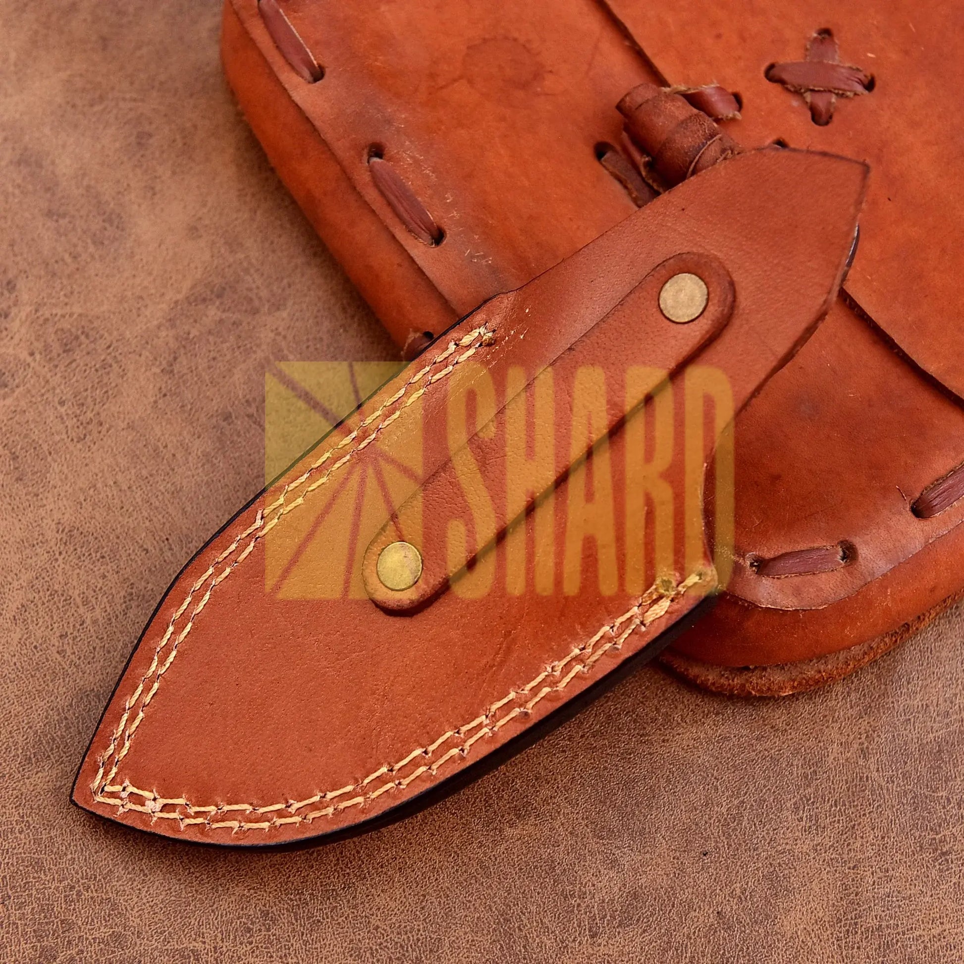 Hand-forged Damascus steel collectible with raindrop pattern and honey-colored resin handle – Raindrop Mini gift piece