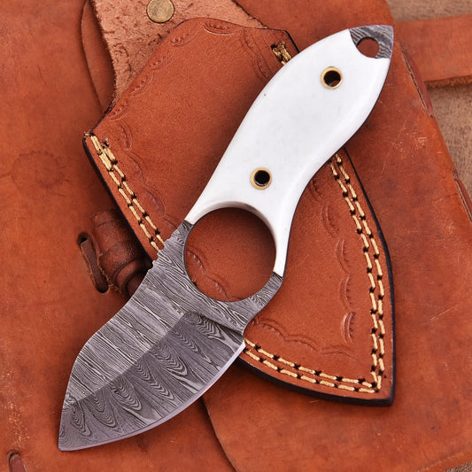 Hand-forged Damascus steel collectible with raindrop pattern and white resin handle – Raindrop Mini gift piece