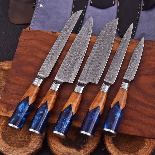 Handmade Oceanhearth Damascus Chef Set with natural wood and deep ocean resin handles – 5-piece collectible culinary set with leather roll.