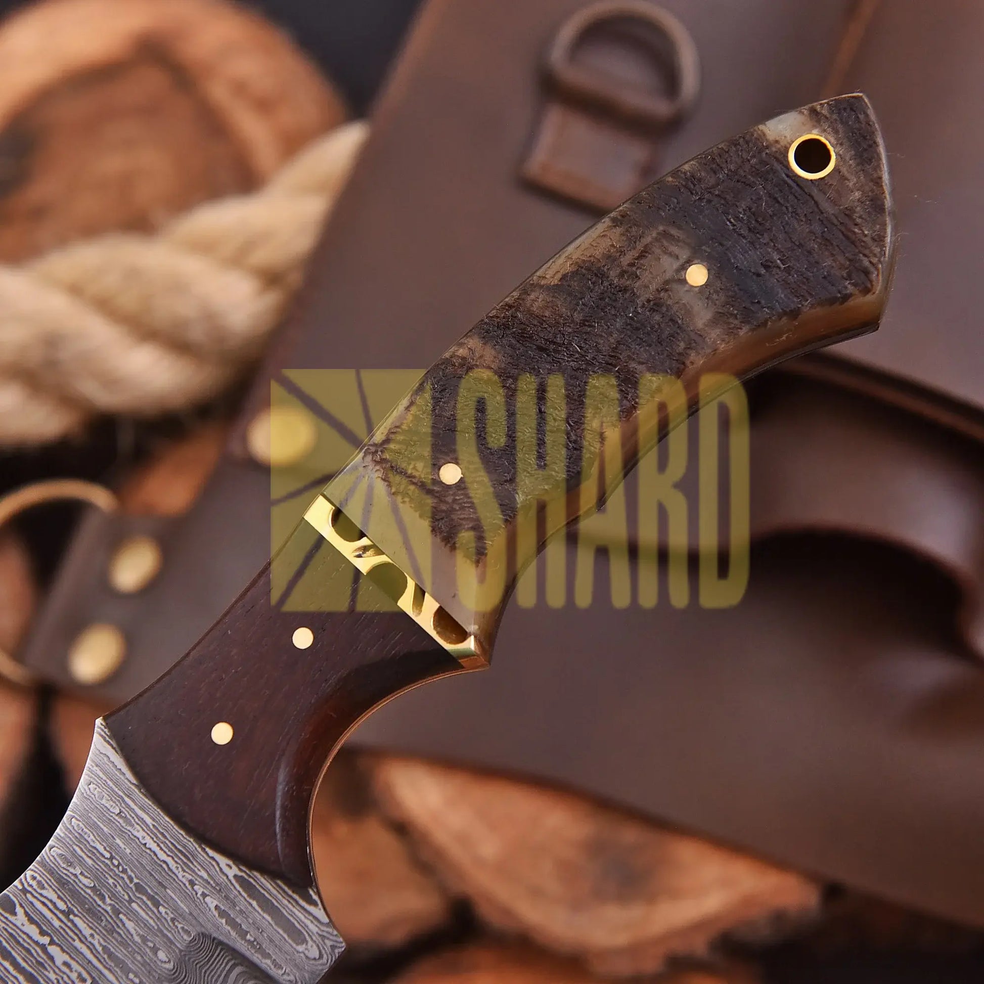 Starlight Voyager Damascus steel collectible with rosewood bolster and stag handle