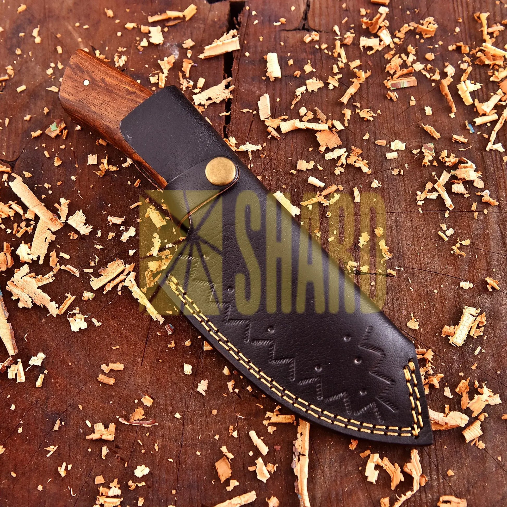 Hand-forged Damascus steel collectible with walnut wood handle and raindrop wave pattern.