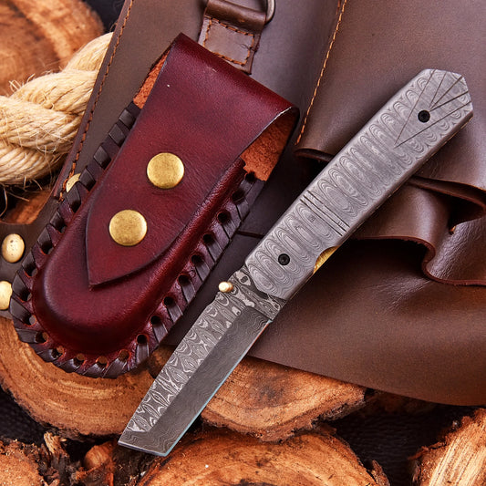 Crimson Crest Damascus Steel Folding Utility Craft with raindrop and wave pattern, featuring folding design and belt buckle clip.
