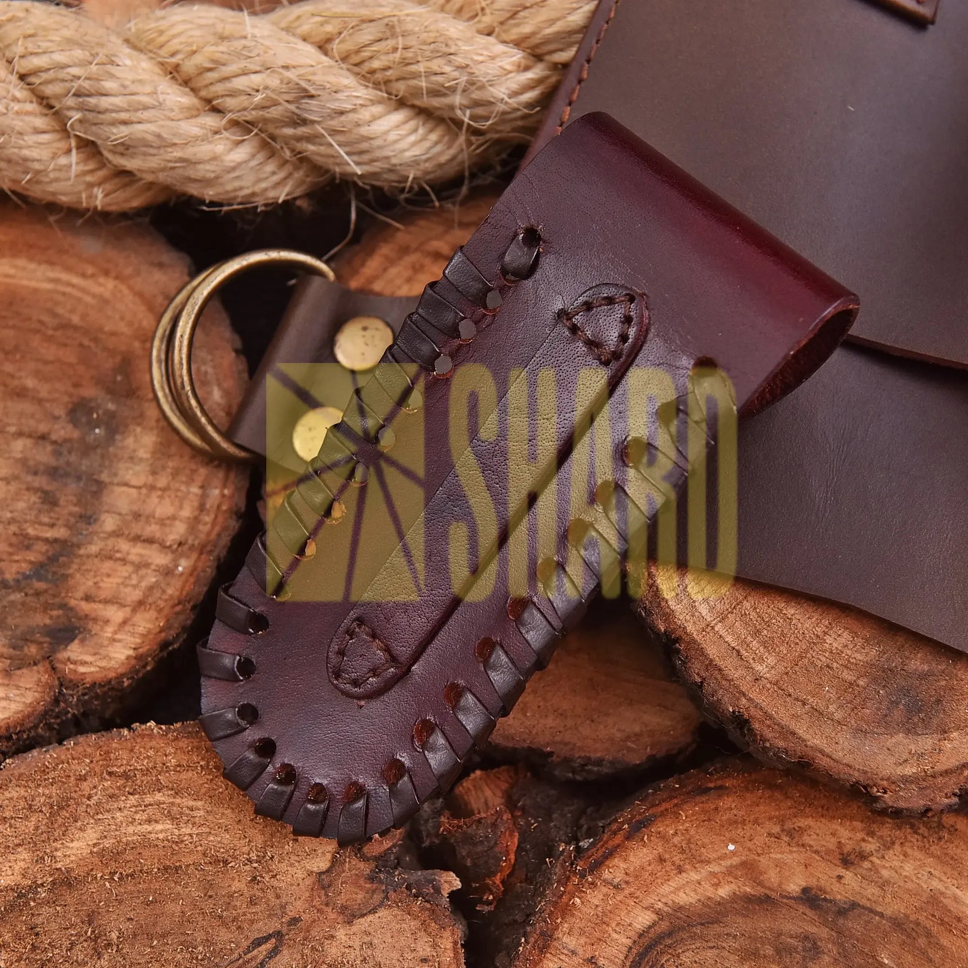 AuroraFold Damascus Collectible with raindrop pattern and folding design, handcrafted with artisan detail