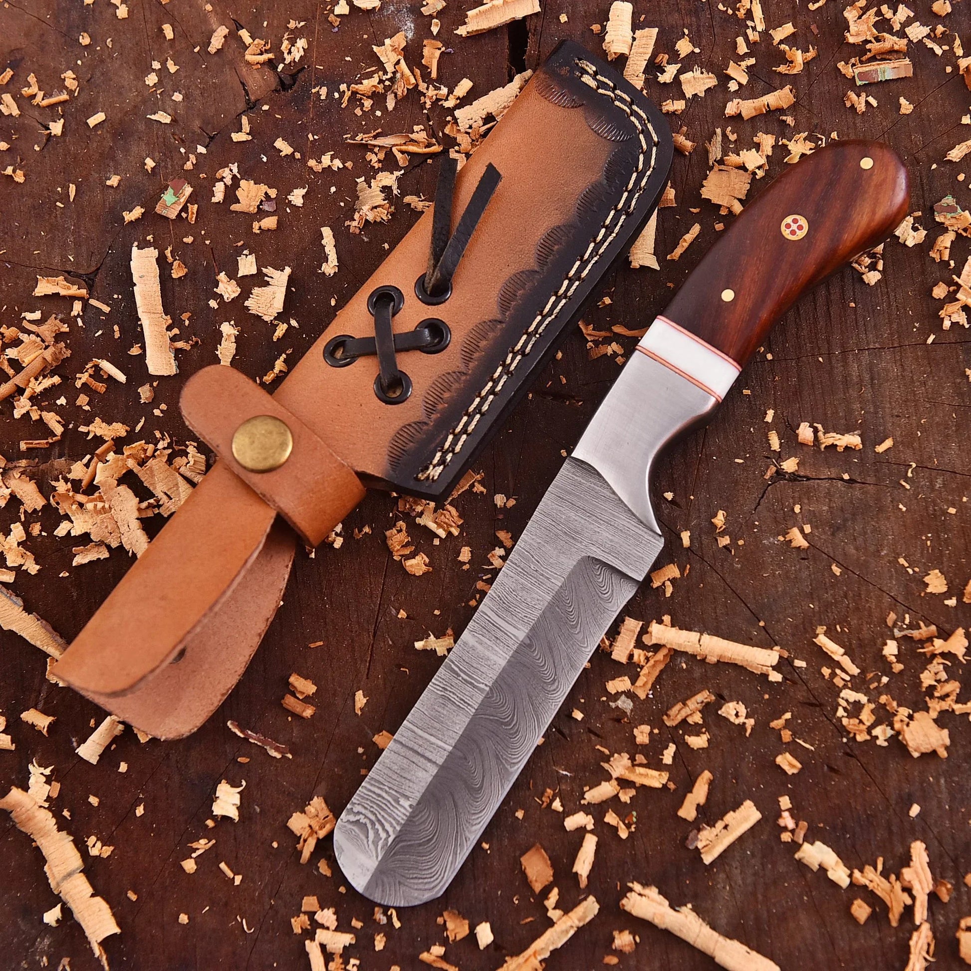 Hand-forged Damascus raindrop steel chef’s tool with steel bolster and Coralfin rosewood handle – Coralfin by Shard Blade