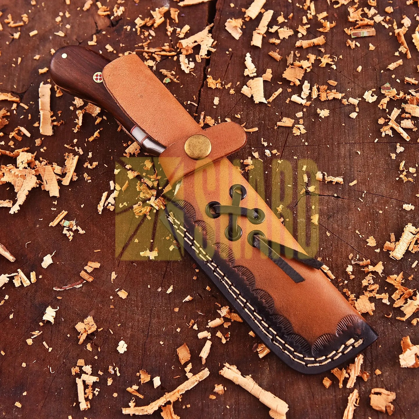 Hand-forged Damascus raindrop steel chef’s tool with steel bolster and Coralfin rosewood handle – Coralfin by Shard Blade