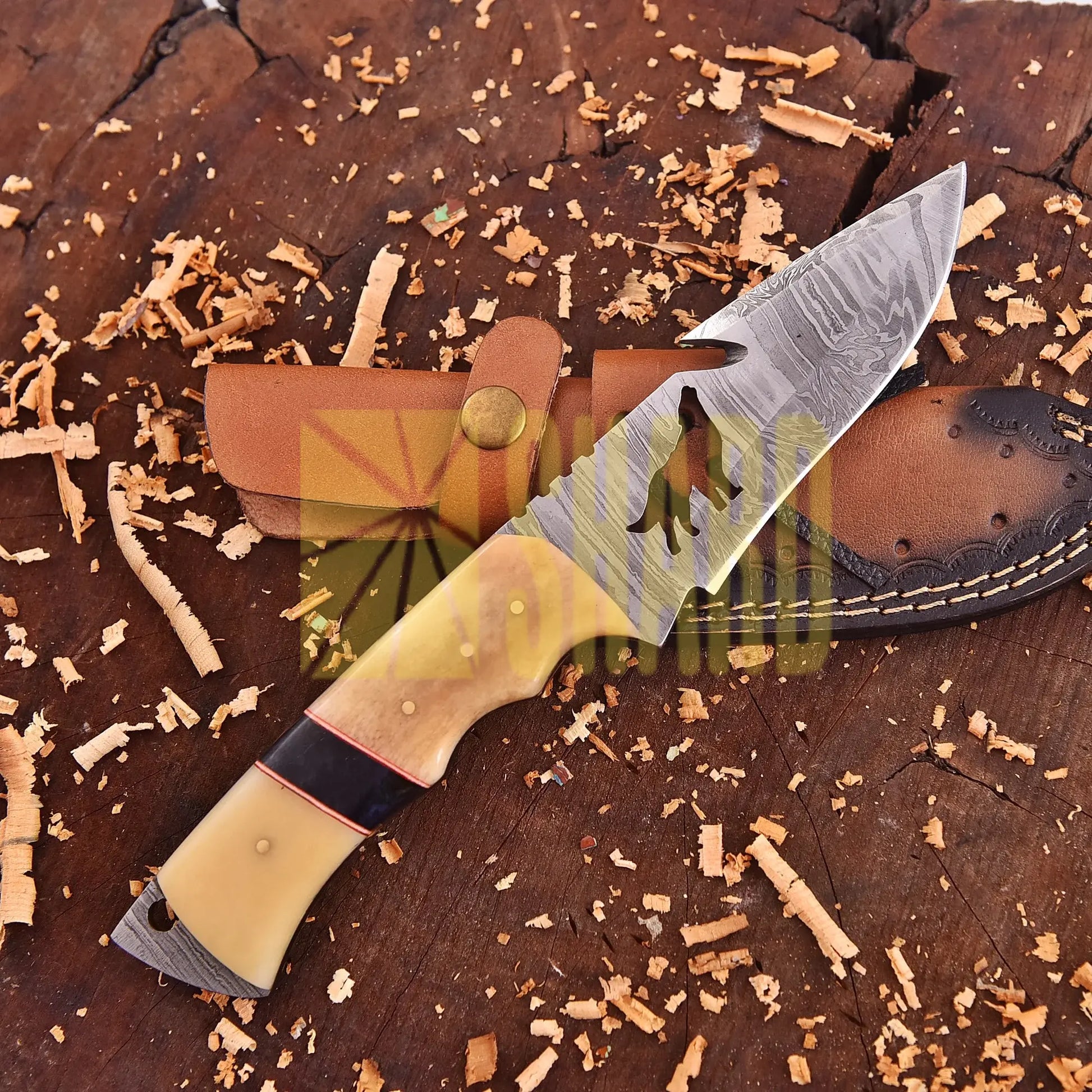 Lunar Howl Damascus collectible with wolf cut-out design and bone handle